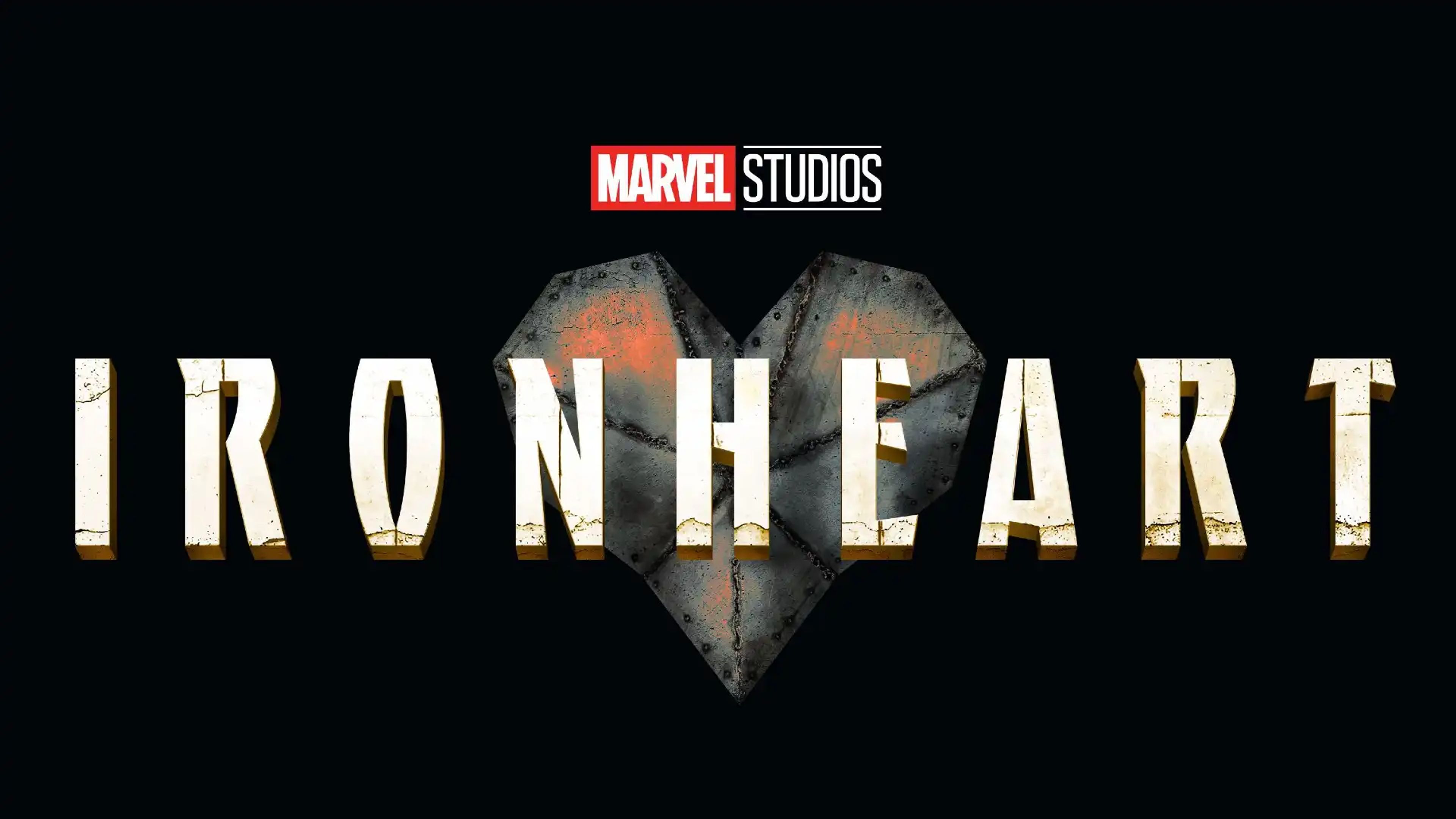 Dominique Thorne as Riri Williams in her Ironheart suit, standing against a backdrop of Chicago's skyline.