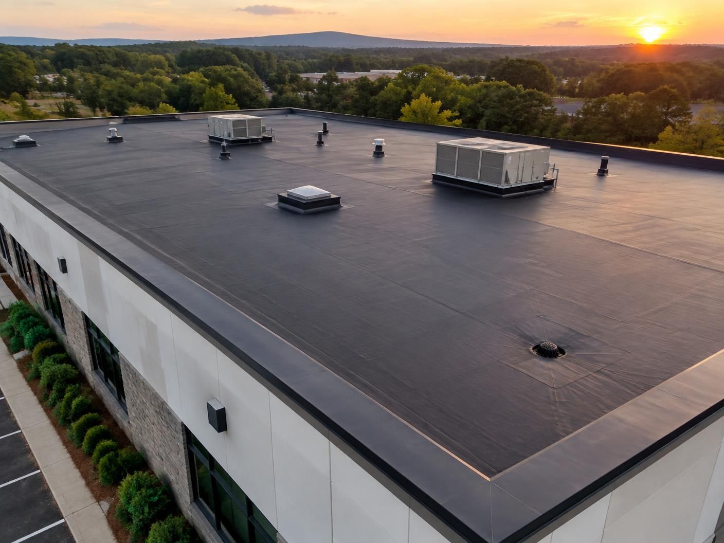 Completed EPDM membrane roof on a low-slope commercial building
