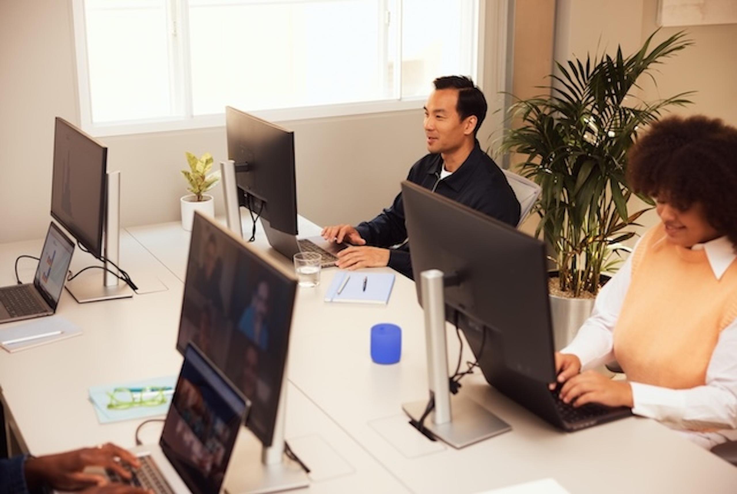 People working at their computers