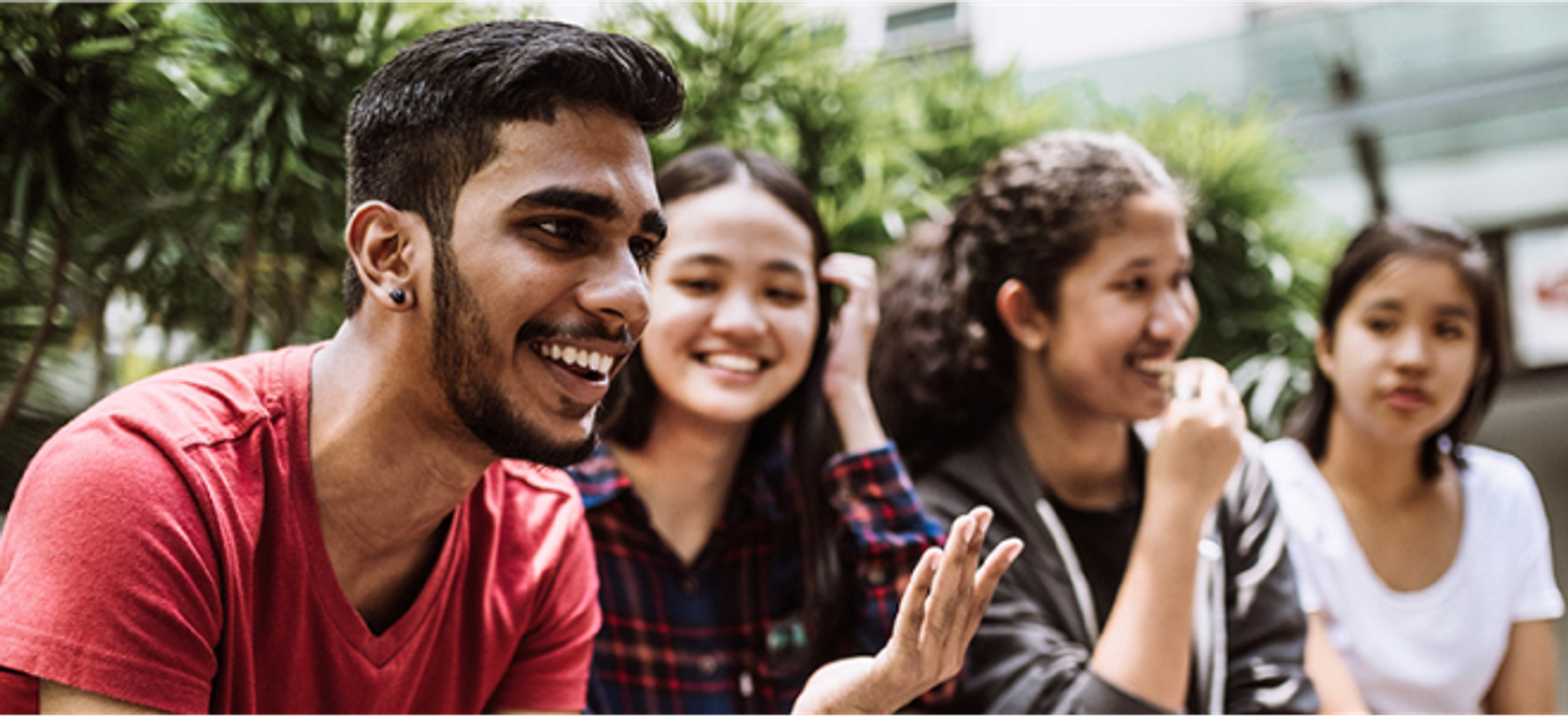 Group of people enjoying a conversation