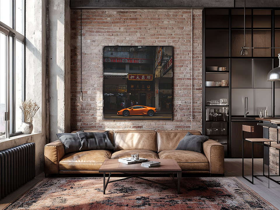 Mur en briques avec voiture orange en décoration murale