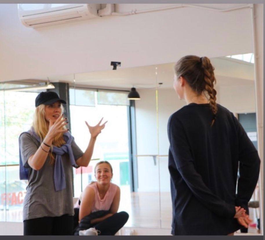 Erin Cornell coaching performers in a studio