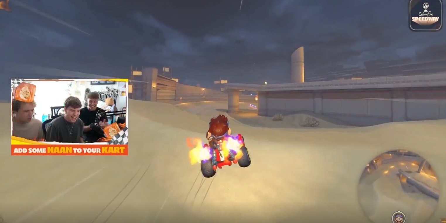 Video game screenshot of a character in a kart racing at night on sand. Four friends are seen in an inset, excitedly reacting. Overlay text: "Add some naan to your kart."