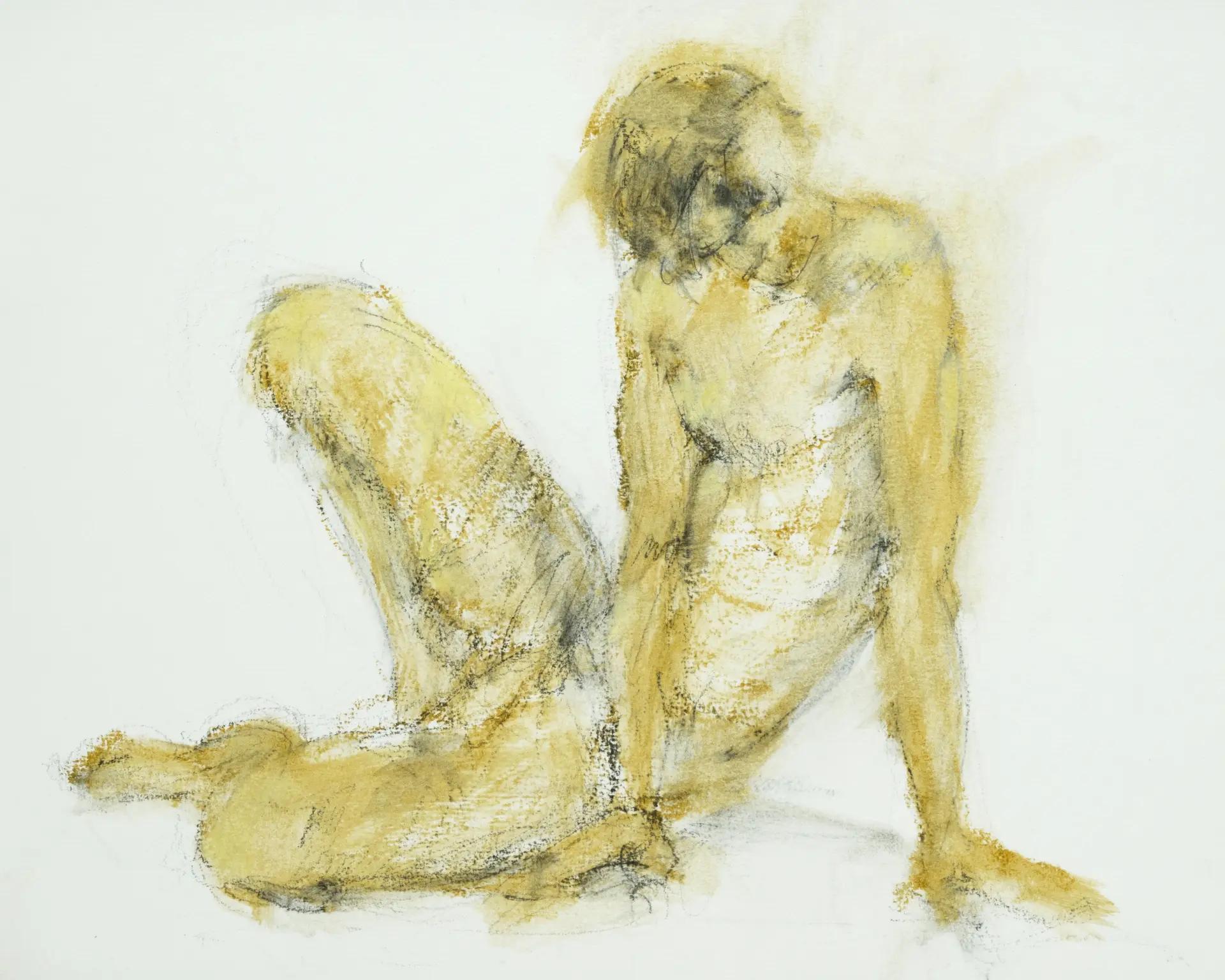 Figura seduta a terra