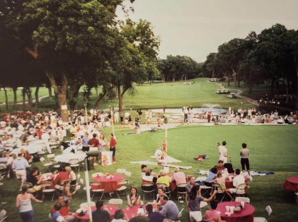 Family Gathering Around the 18th Green