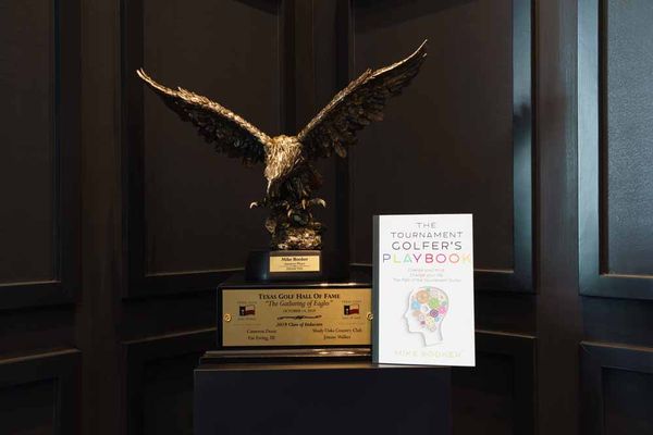 Mike Booker's TGHOF Induction Trophy and book