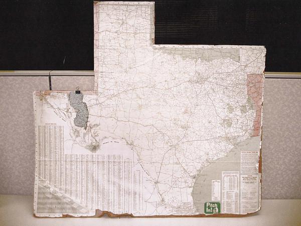 Texas map in Bill Penn's office showing how small New Jersey is