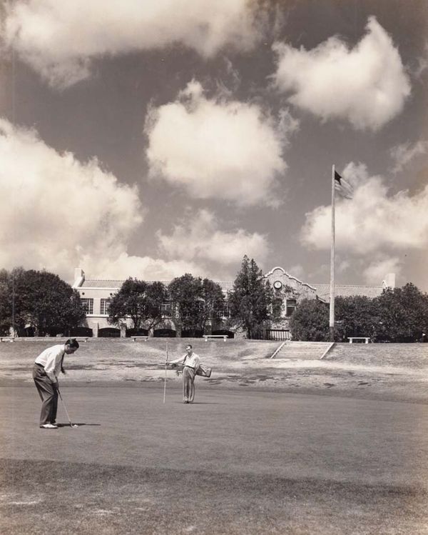 New Head Pro Tod Menefee aims for the cup at San Antonio Country Club 1939