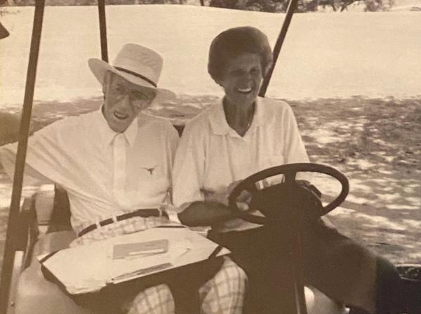 Harvey Penick - Photo in a Golf Cart with Kathy
