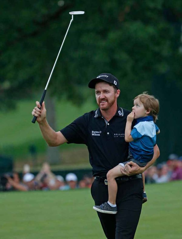 Celebrating a PGA Championship win with his son