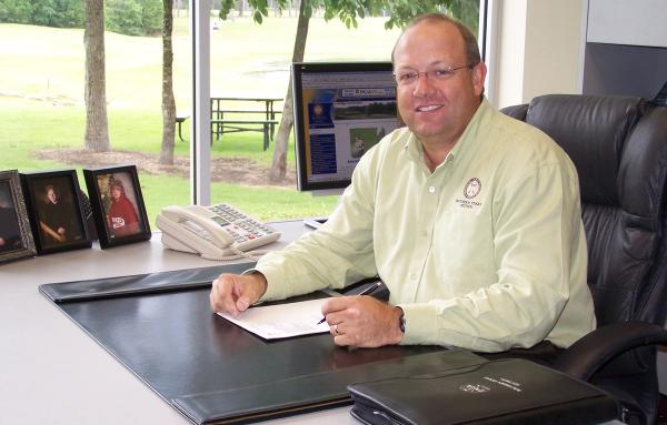 Mike Ray at His Desk