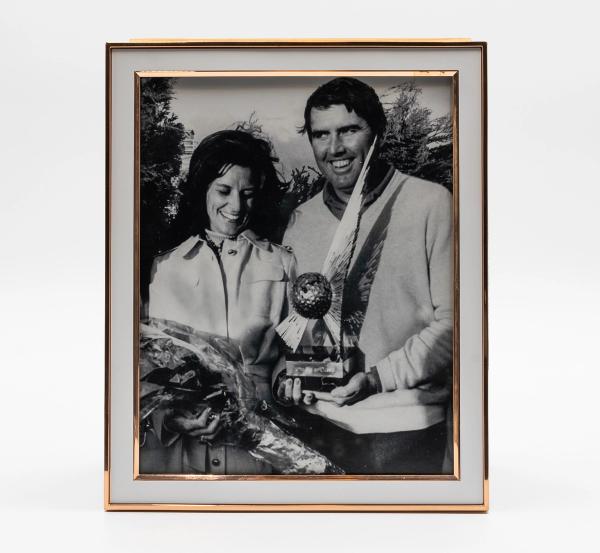 Lynette and Charles Coody pictured with John Player Classic trophy