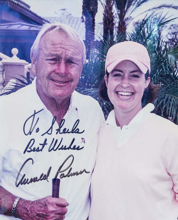 A signed photo of Arnold Palmer and Duke's wife