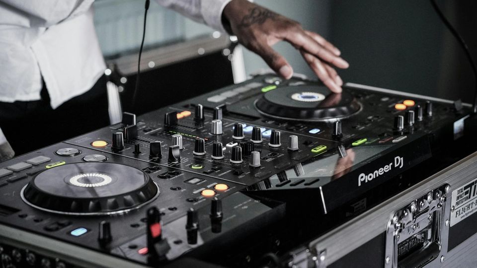 Pioneer CDJ players in a professional DJ booth setup