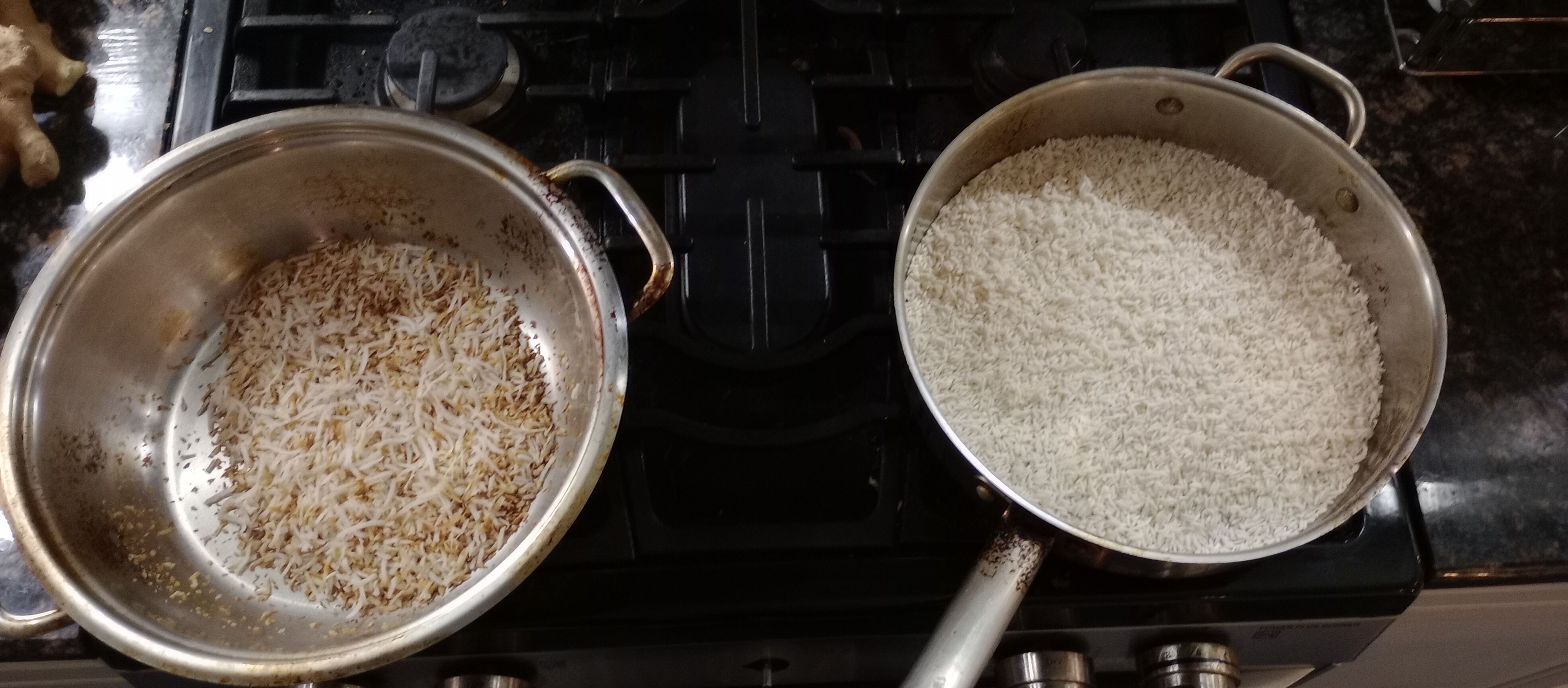 Shredded coconut and raw sweet rice toasting in separate pans on a stovetop.