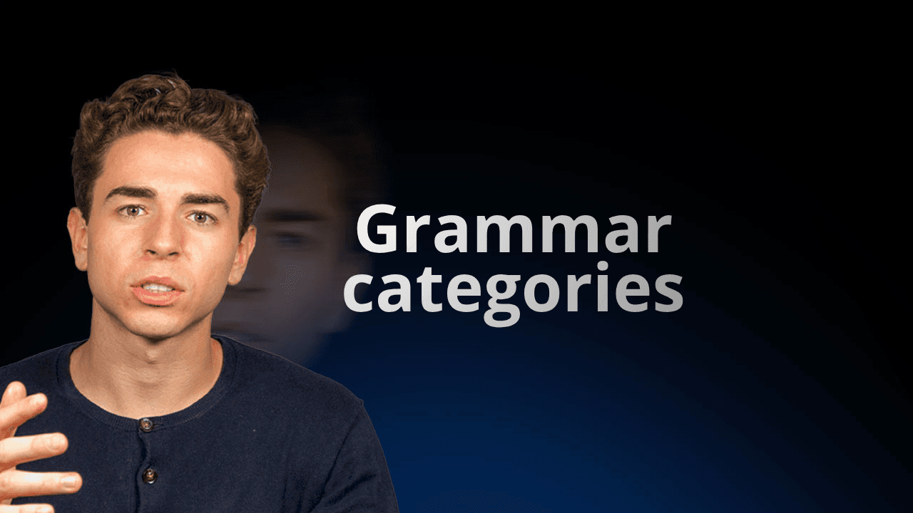 flowexam.com teacher explaining in English grammar categories on a blackboard with examples for TOEIC® preparation
