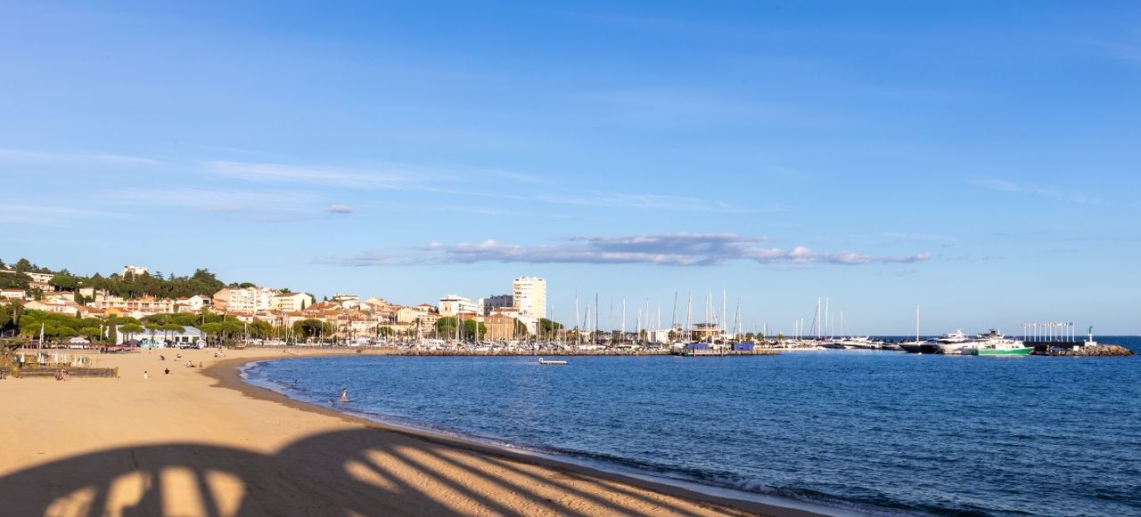 Sainte Maxime, Var, France - Shadow of Sainte-Maxime bridge on the beach