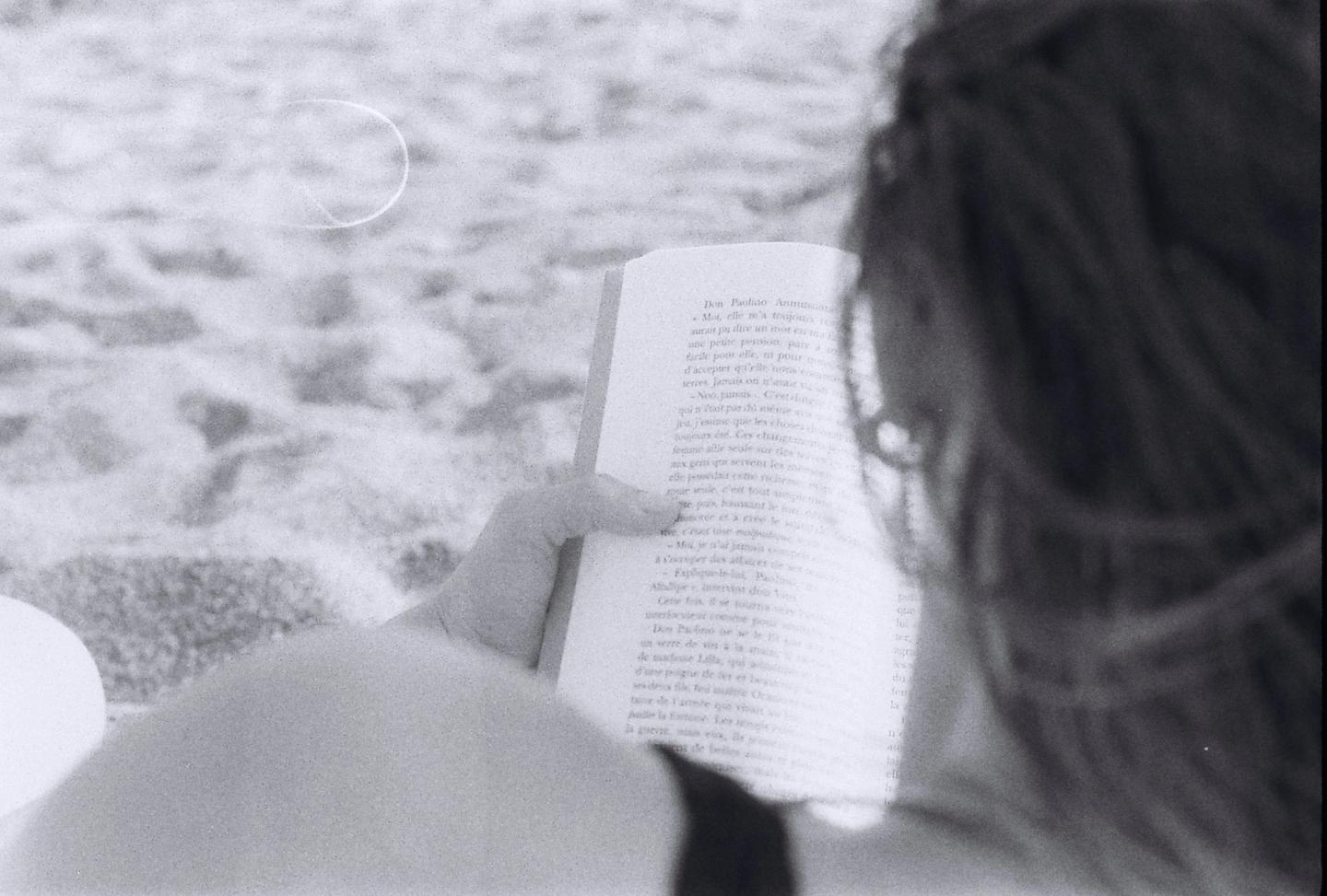 Reading on the Sicilian beach