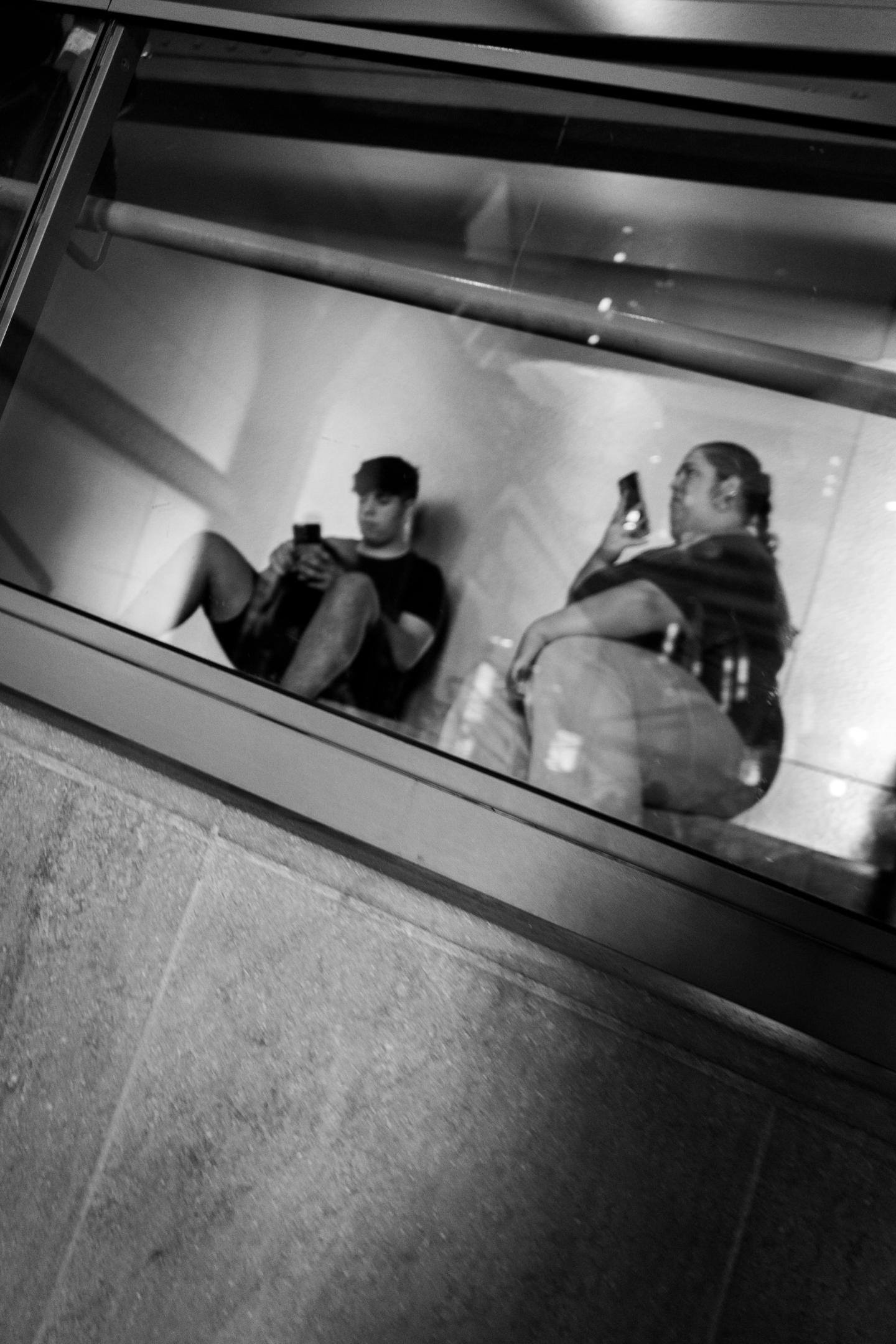 Museum visitors on phone