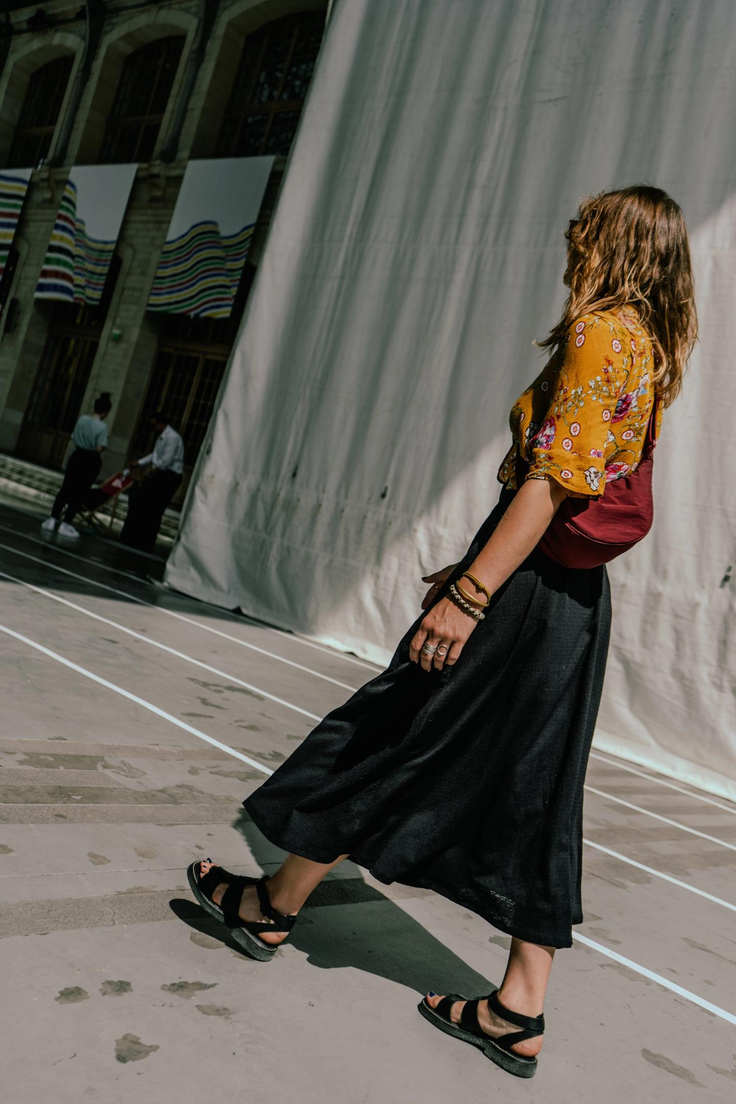 A woman walking in Paris