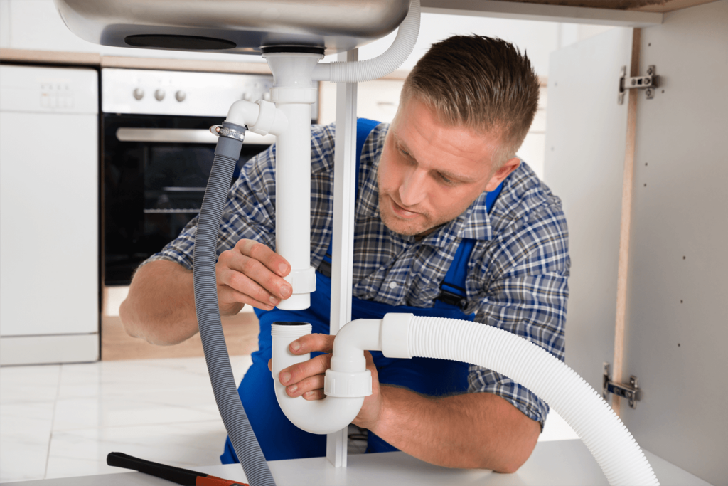 Plumber Fixing Sink