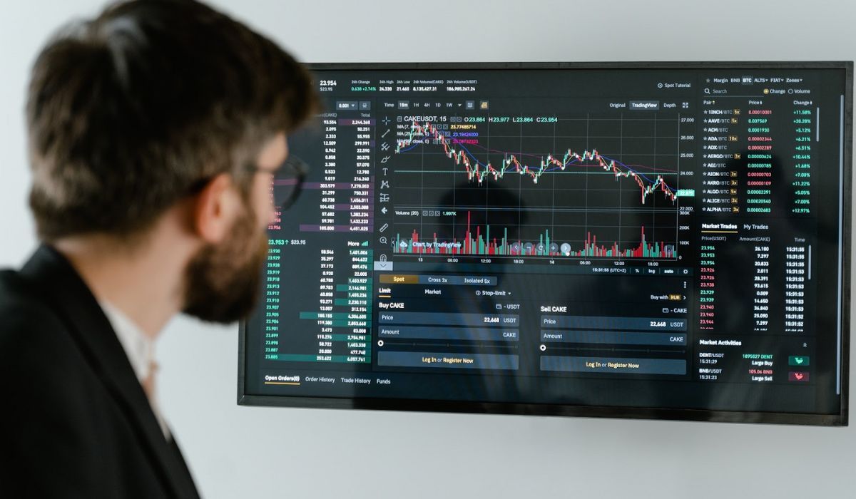 person looking at screen - Best Crypto Trading Terminal