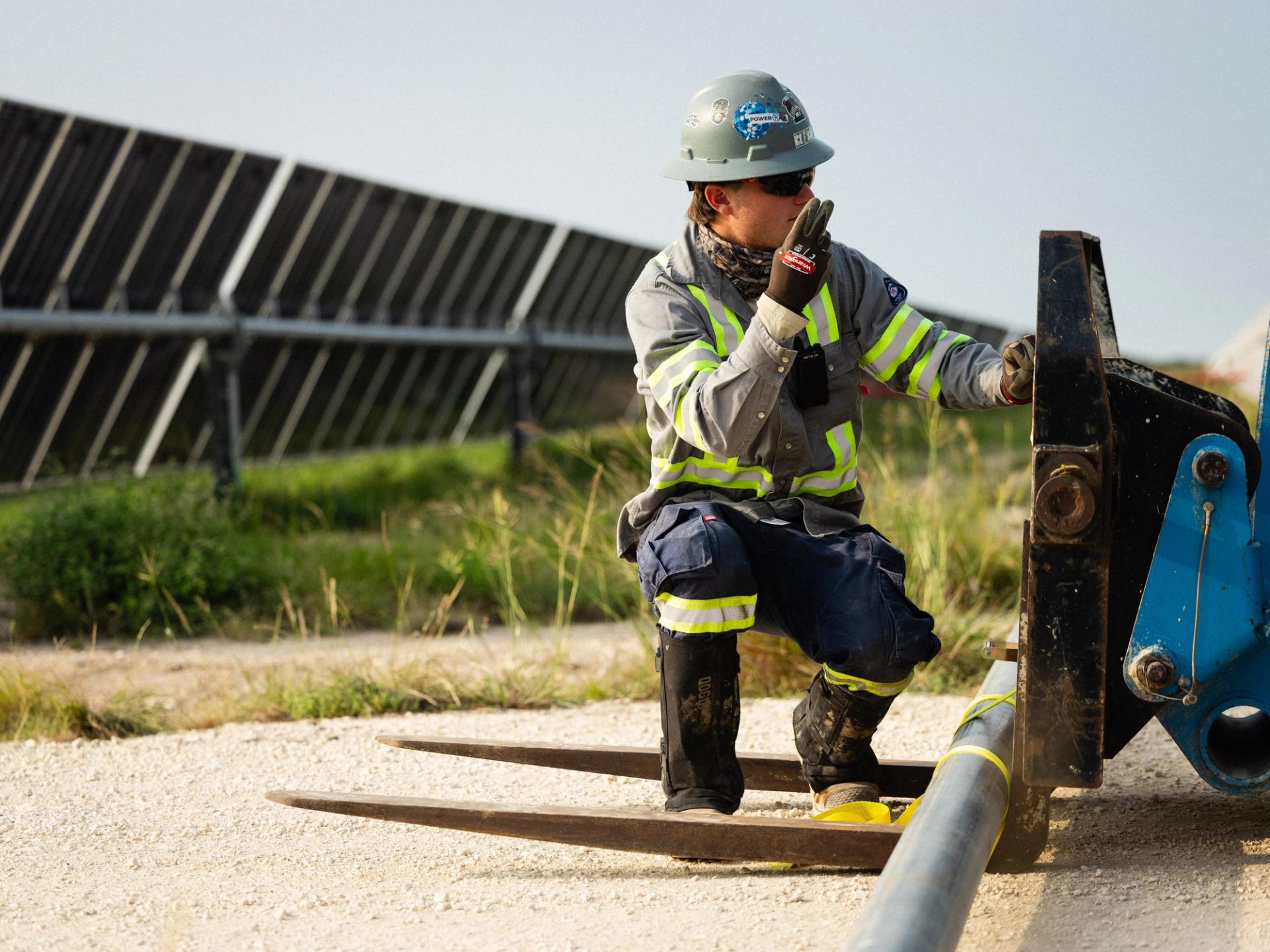 Power Ray electrical crew installing medium voltage equipment on a utility-scale solar site