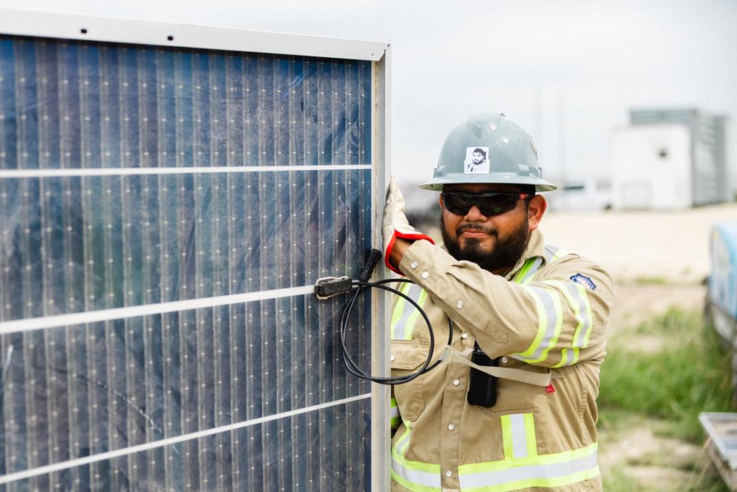 Power Ray crew installing solar racking on site