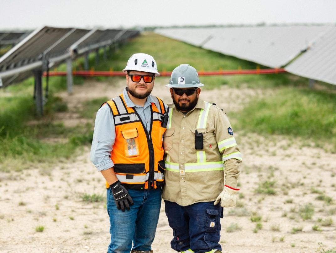 Power Ray team members on a solar construction site