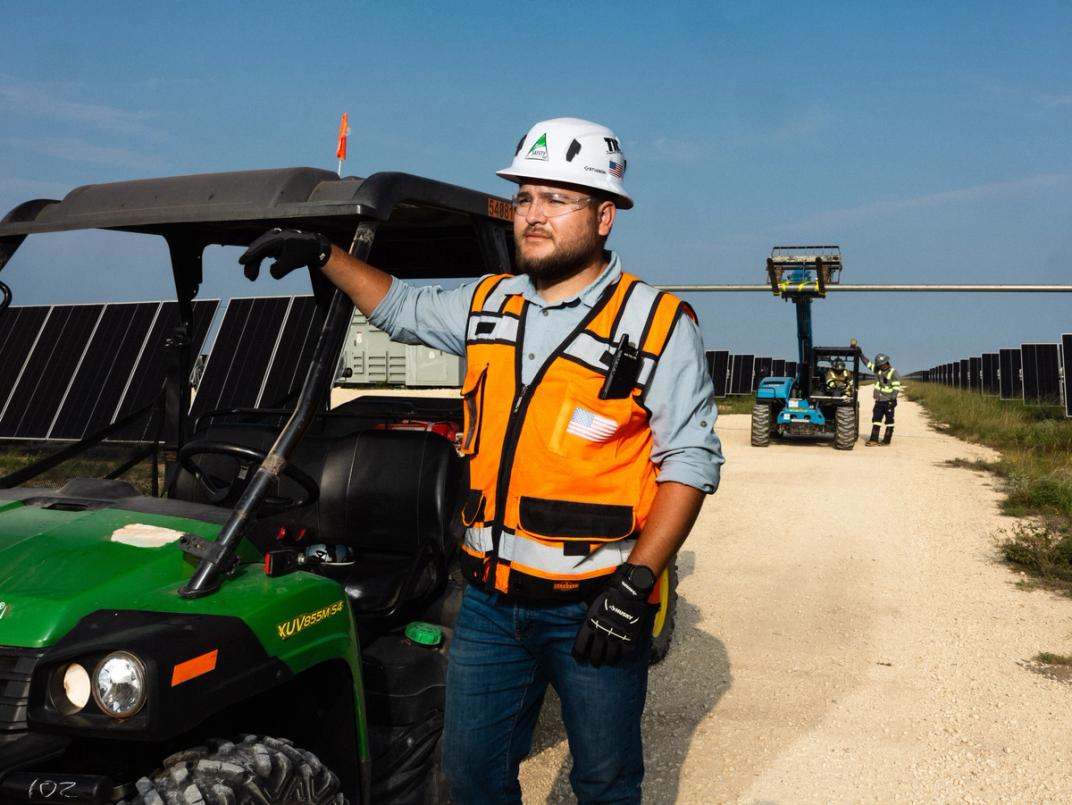 Power Ray crew member with equipment on site
