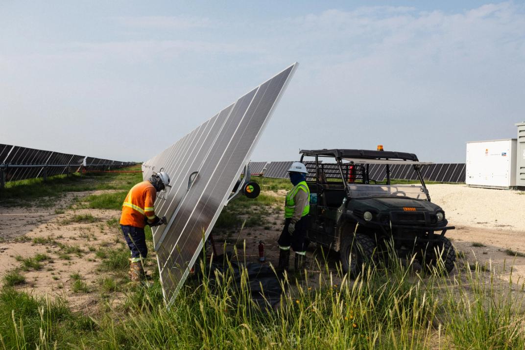 Tracker structures being aligned on a utility-scale solar field