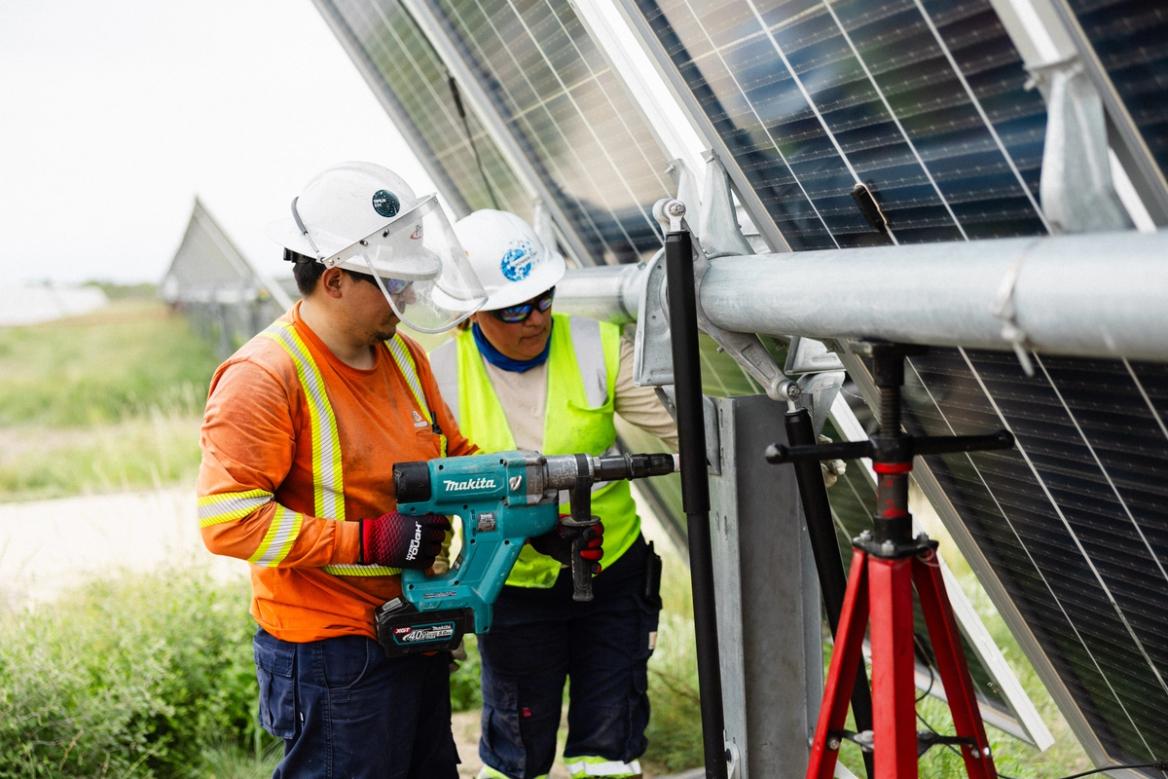 Solar construction crews on a utility-scale site