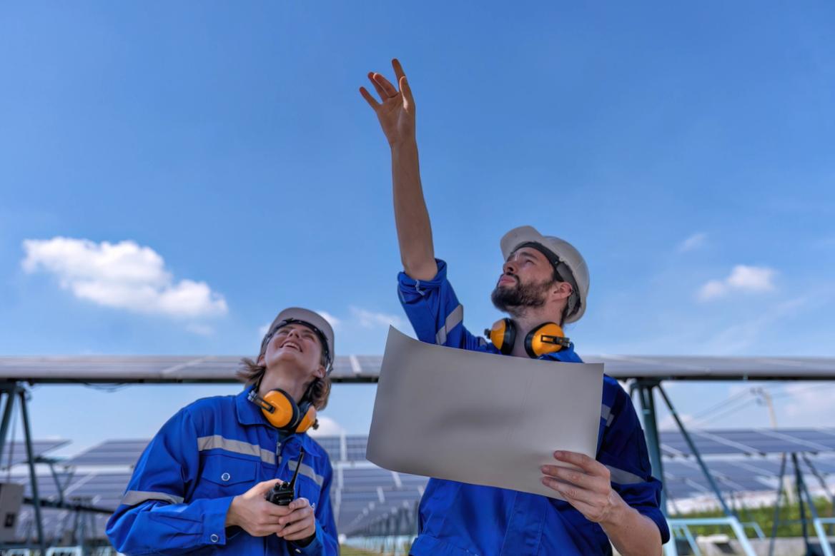 Solar crew restoring panels after a storm