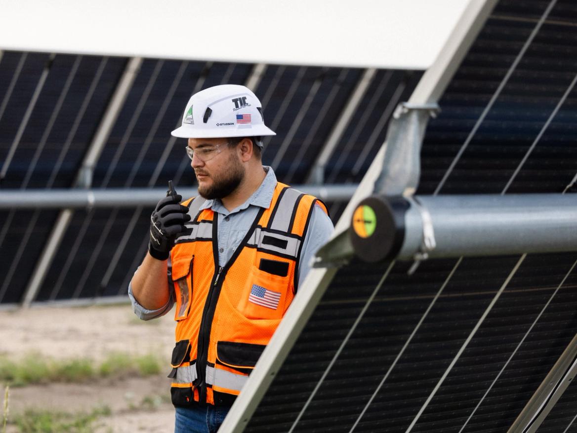Power Ray electrician working on inverter pad