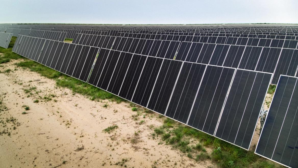 Solar field with racking installed at sunset