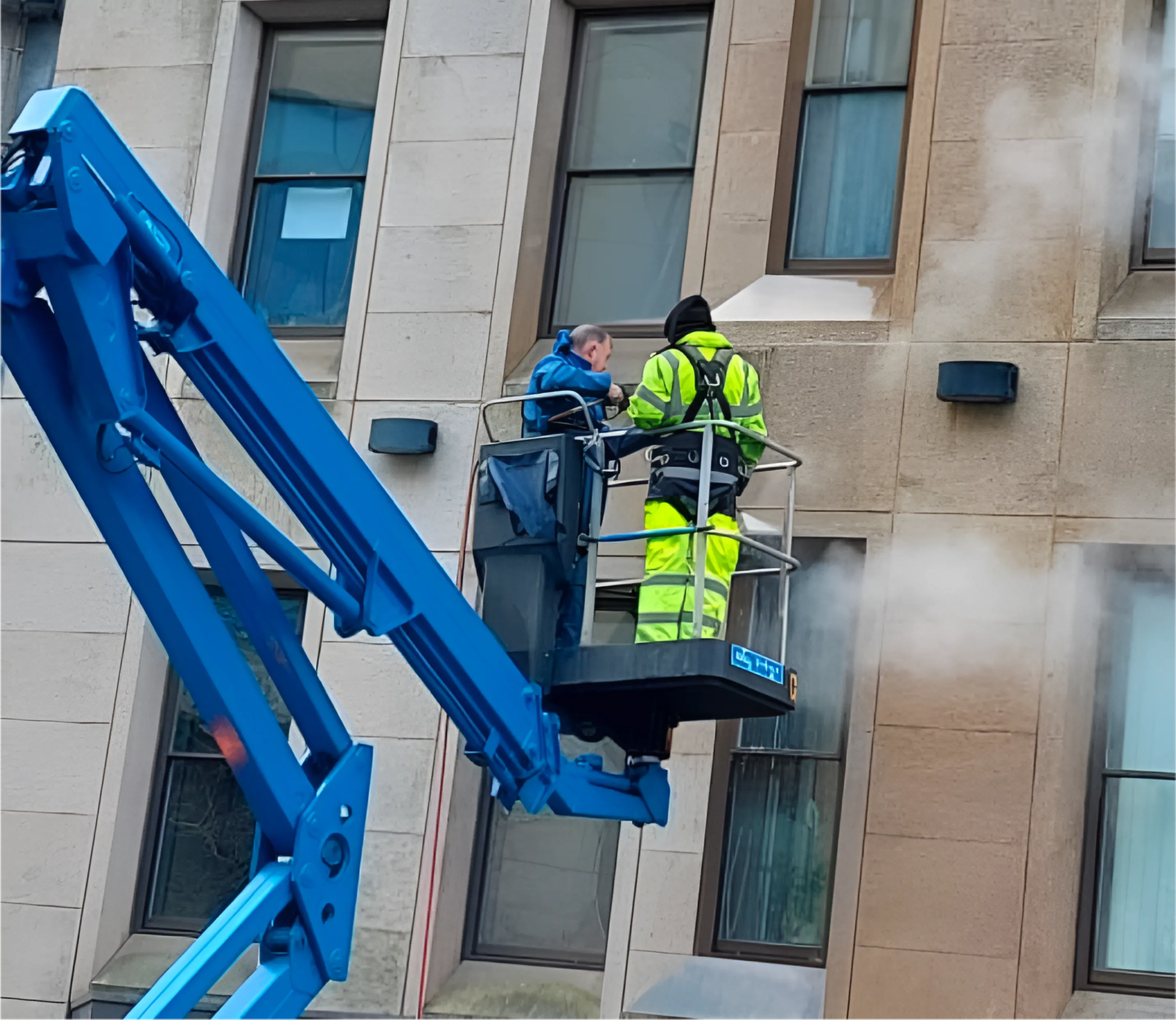 Soft wash jet cleaning on redwood house GY1 Guernsey