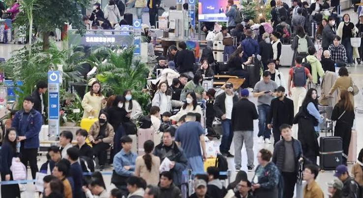 Travelers at an international airport in South Korea