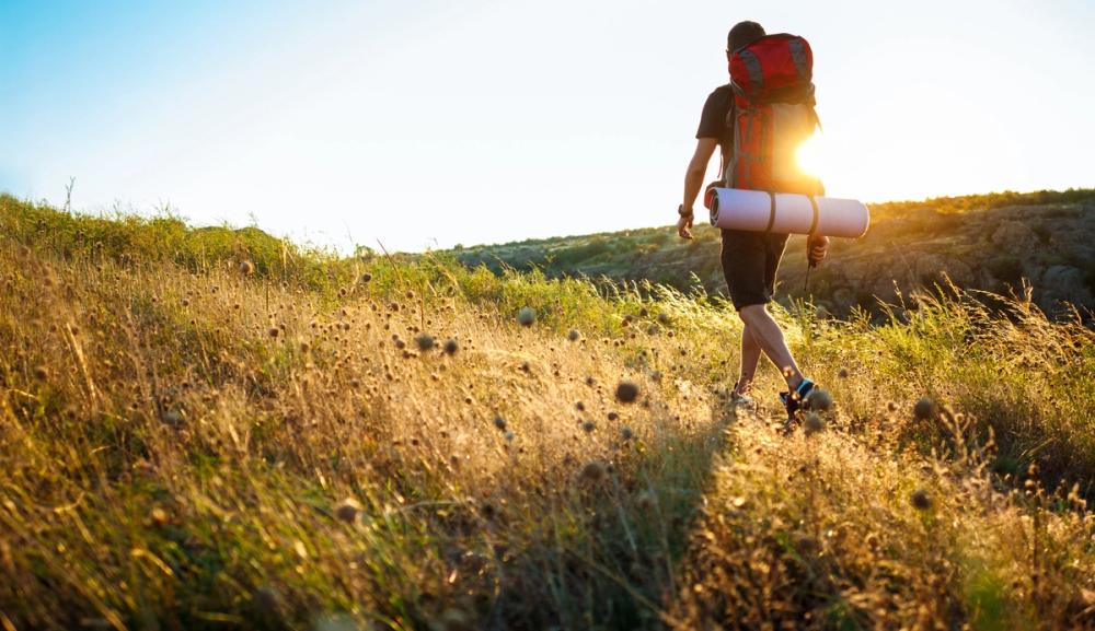 Mann på tur på fjellet