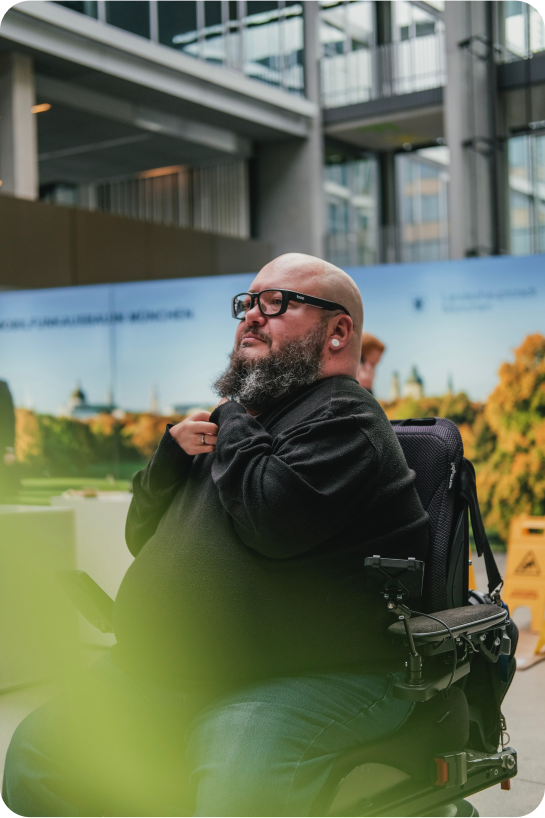 Head control for a man in a wheelchair with a beard Head control for a bearded man in a wheelchair
