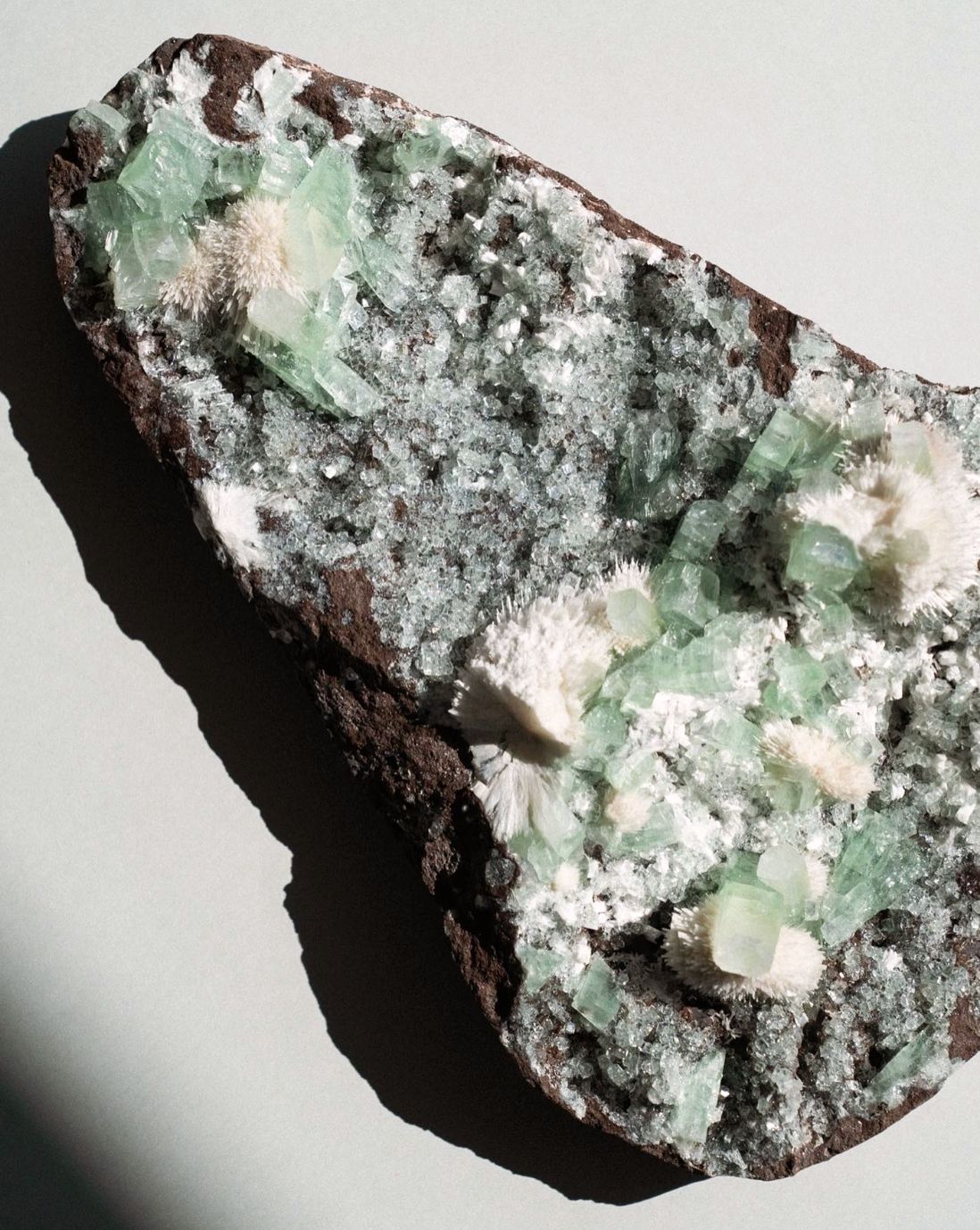 Close up of a green aphophyllite crystal