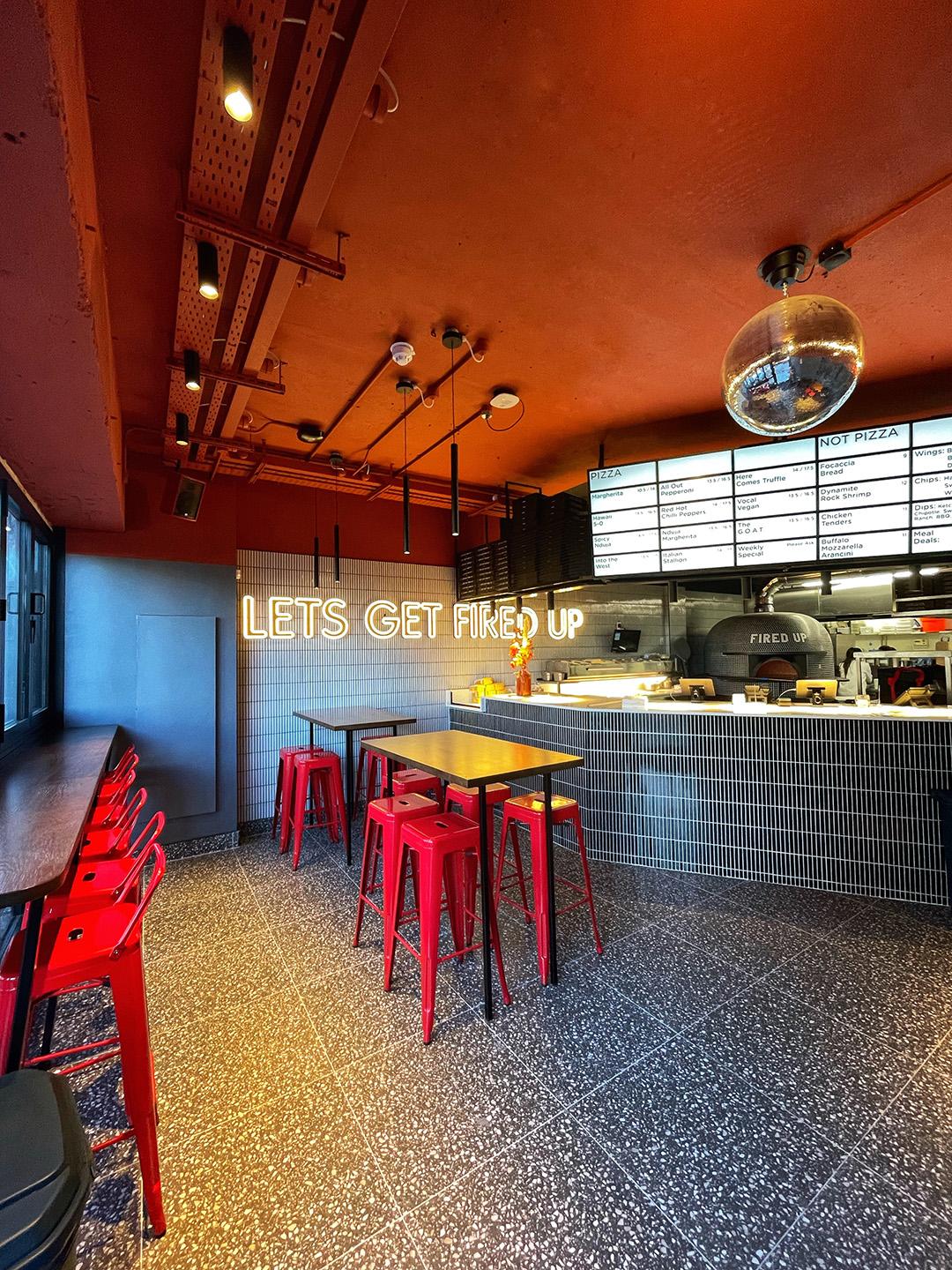 The open plan kitchen and dining room at Fired Up Pizza Donnybrook