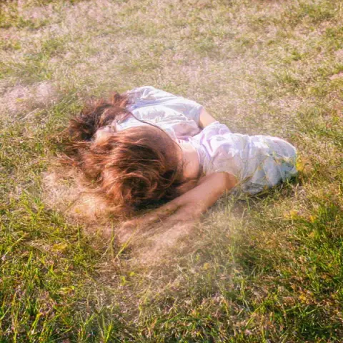 Lying in the grass