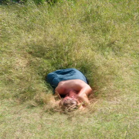 Lying in the grass