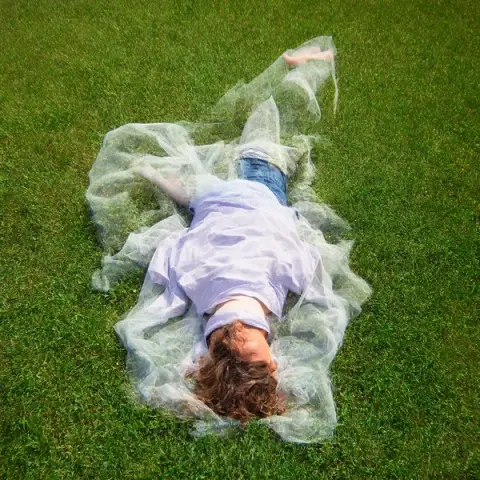 Lying in the grass
