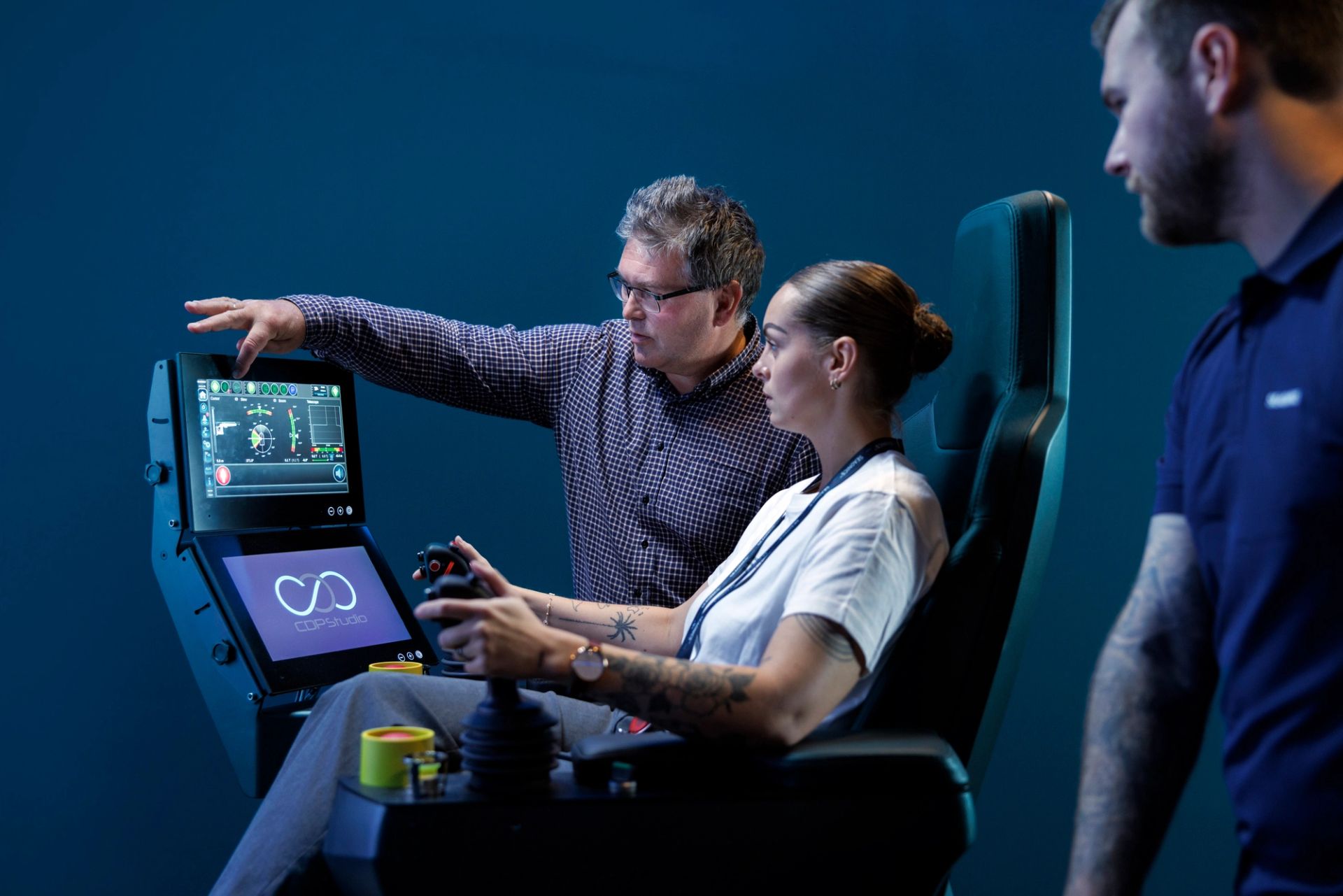 Operator using a crane and gangway training simulator with realistic digital twin visuals