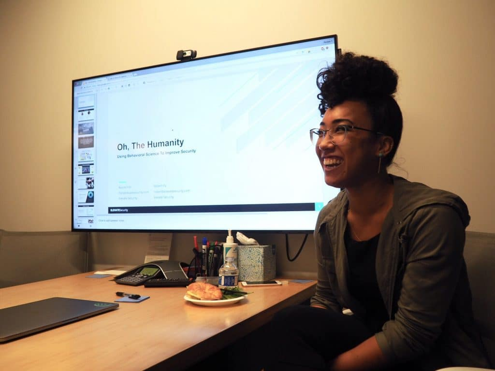 A picture of Elevate software developer Nicole Fish presenting during Day of Shecurity
