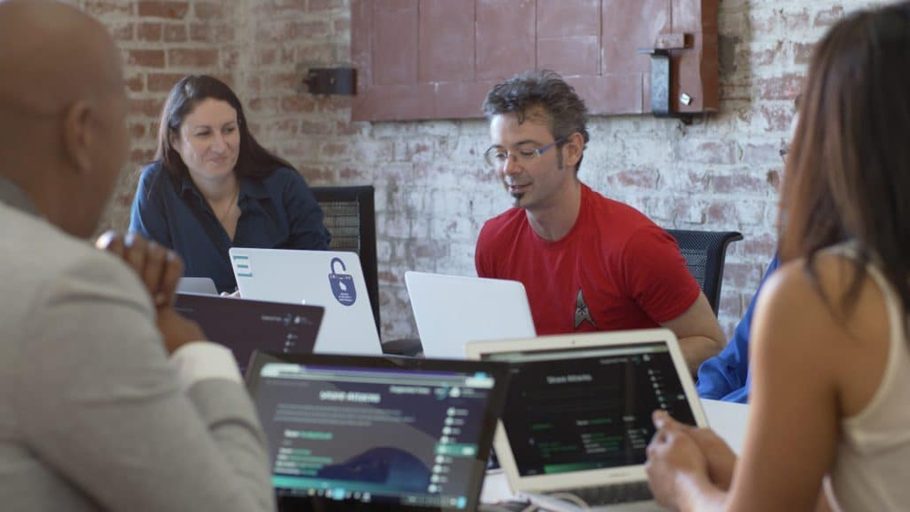 A group of employees playing Hacker's Mind