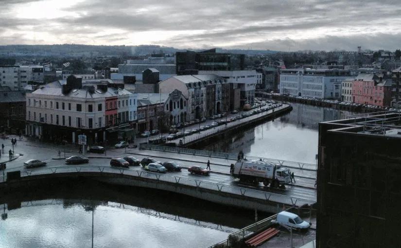 View of bridge going over water in Cork, Ireland.