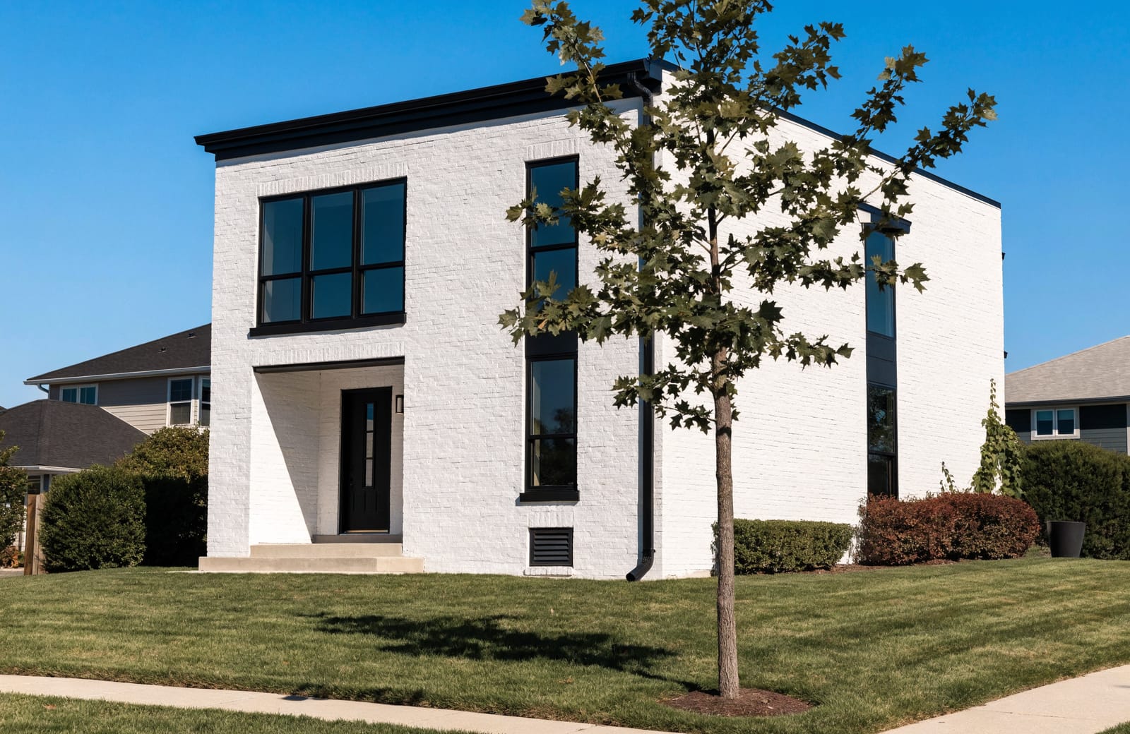 A modern single-family home exterior in a Dallas suburb