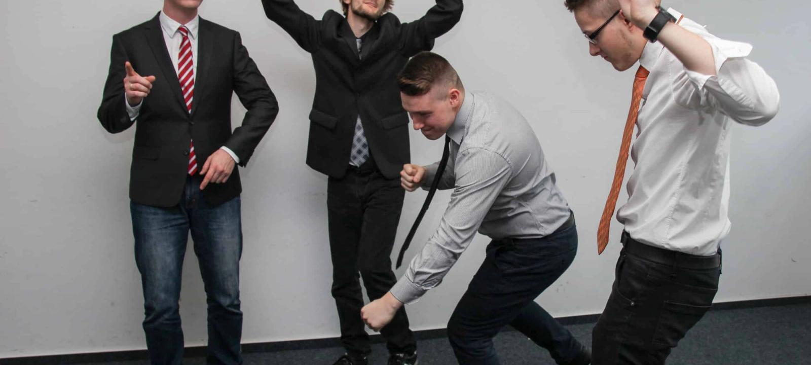 Lawyers celebrating the superior features of Quilia over Case Status for client management